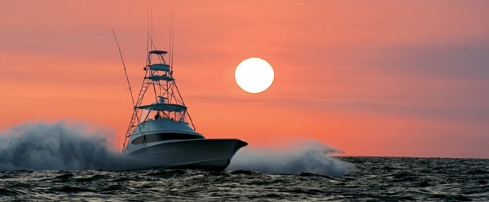 Boat on the water during sunset