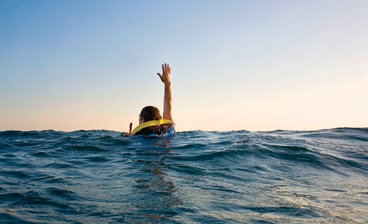 Person floating in water