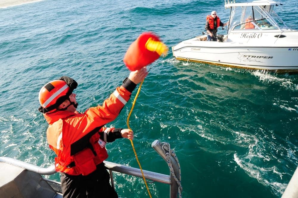 A rescue crew throwing a line.