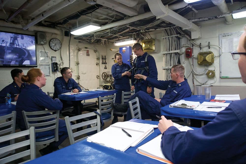 A crew in a meeting hall