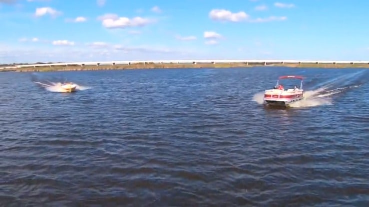 pontoon and speedboat on the water
