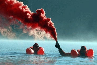 Emergency flare at sea.