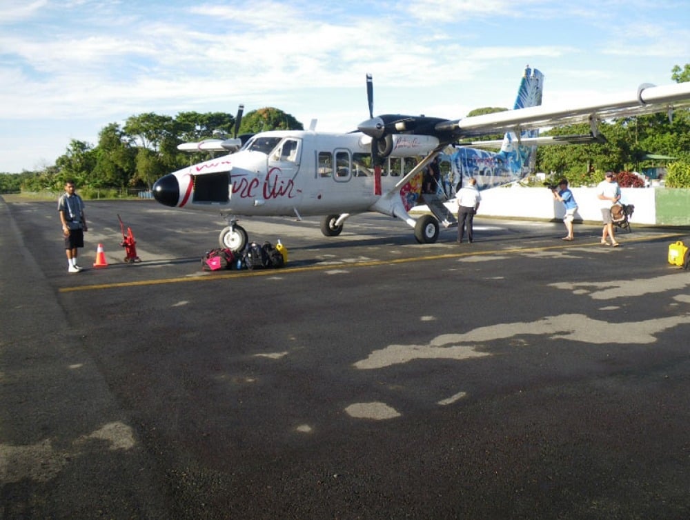 A small plane on a runway.