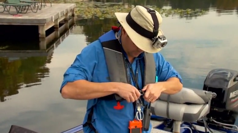 A fishing angler checking gear