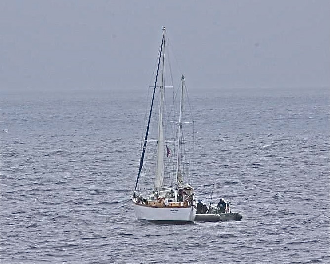 sailboat taking on water