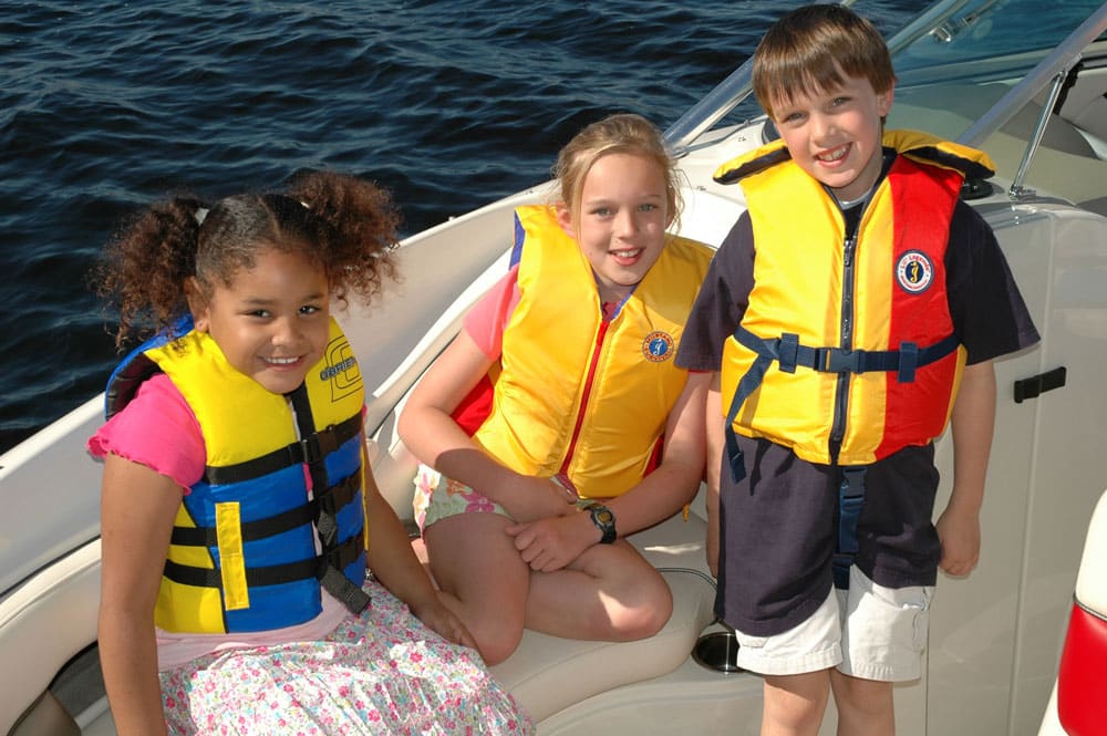 kids on a boat