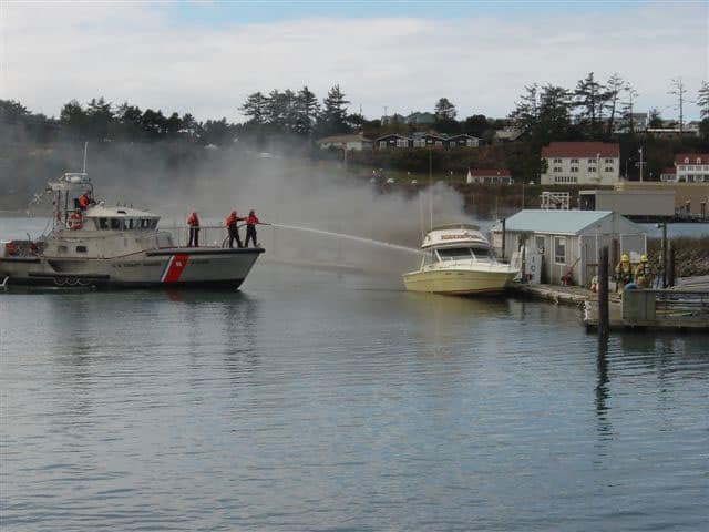 USCG putting out a boat fire