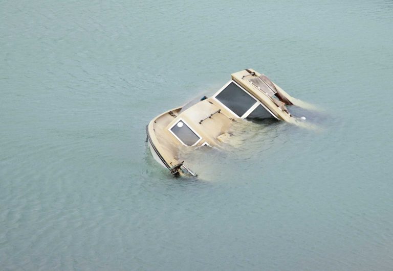 boat submerged under water