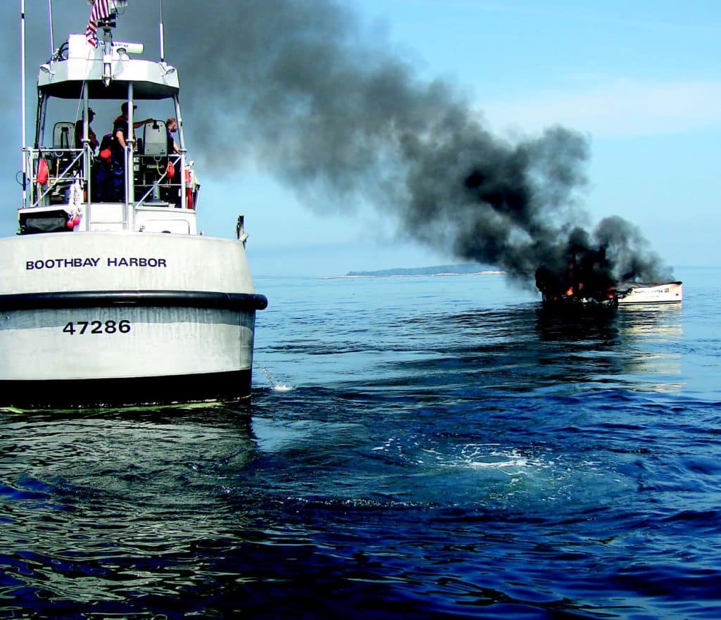 coast guard arriving at boat fire