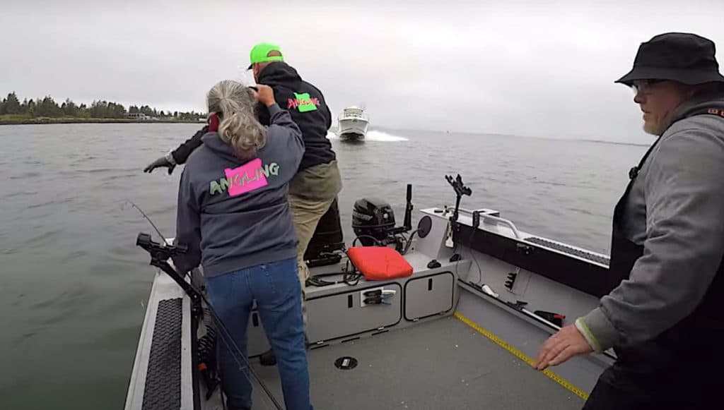 Boat bearing down on anglers