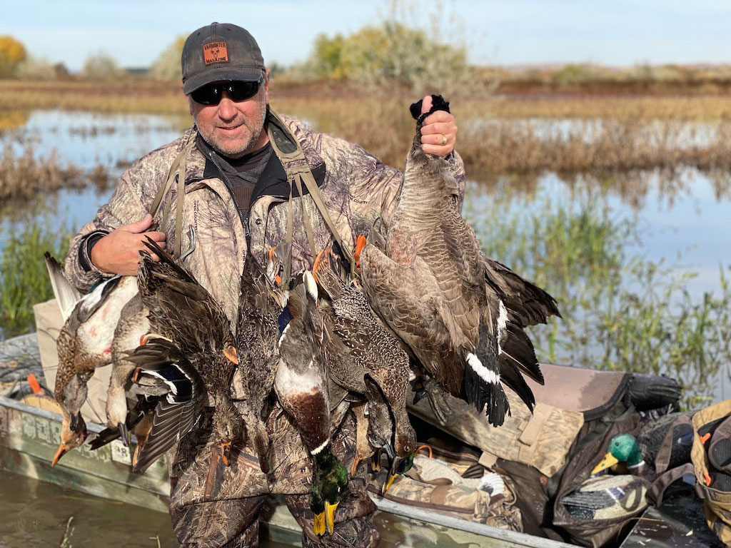 Hunter with ducks