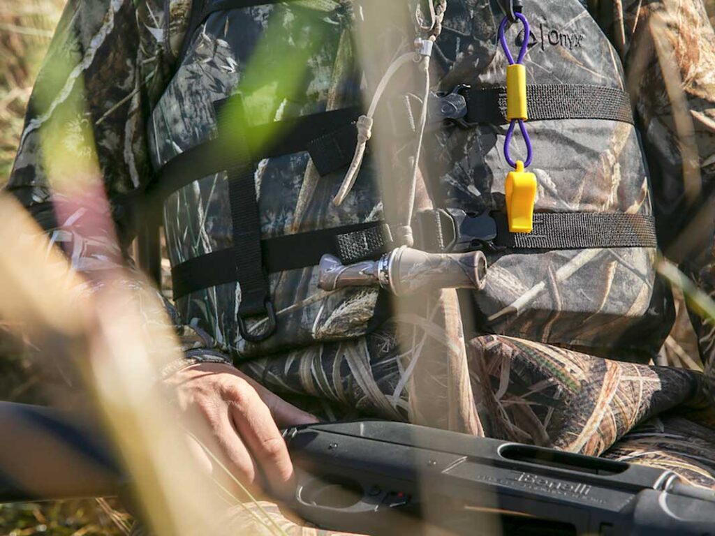 Duck hunter wearing a life jacket