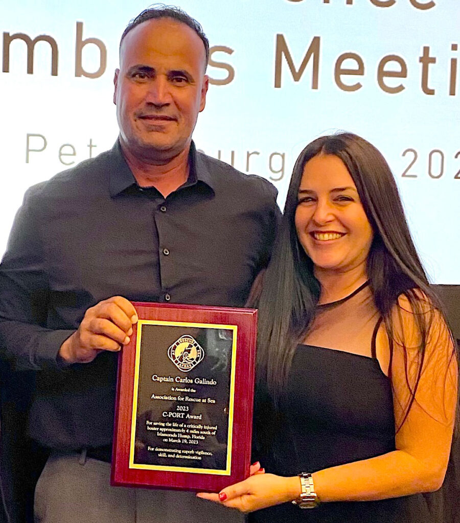 Carlos and Ilene Galindo with the award