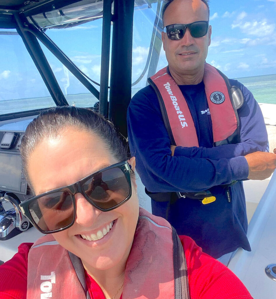 Carlos and Ilene on one of their boats