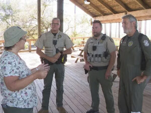 DeNell with FWC officers